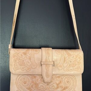 Beautiful hand tooled, leather Crossbody bag.